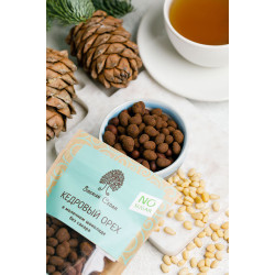 Pine nuts in milk chocolate without sugar / 60 g